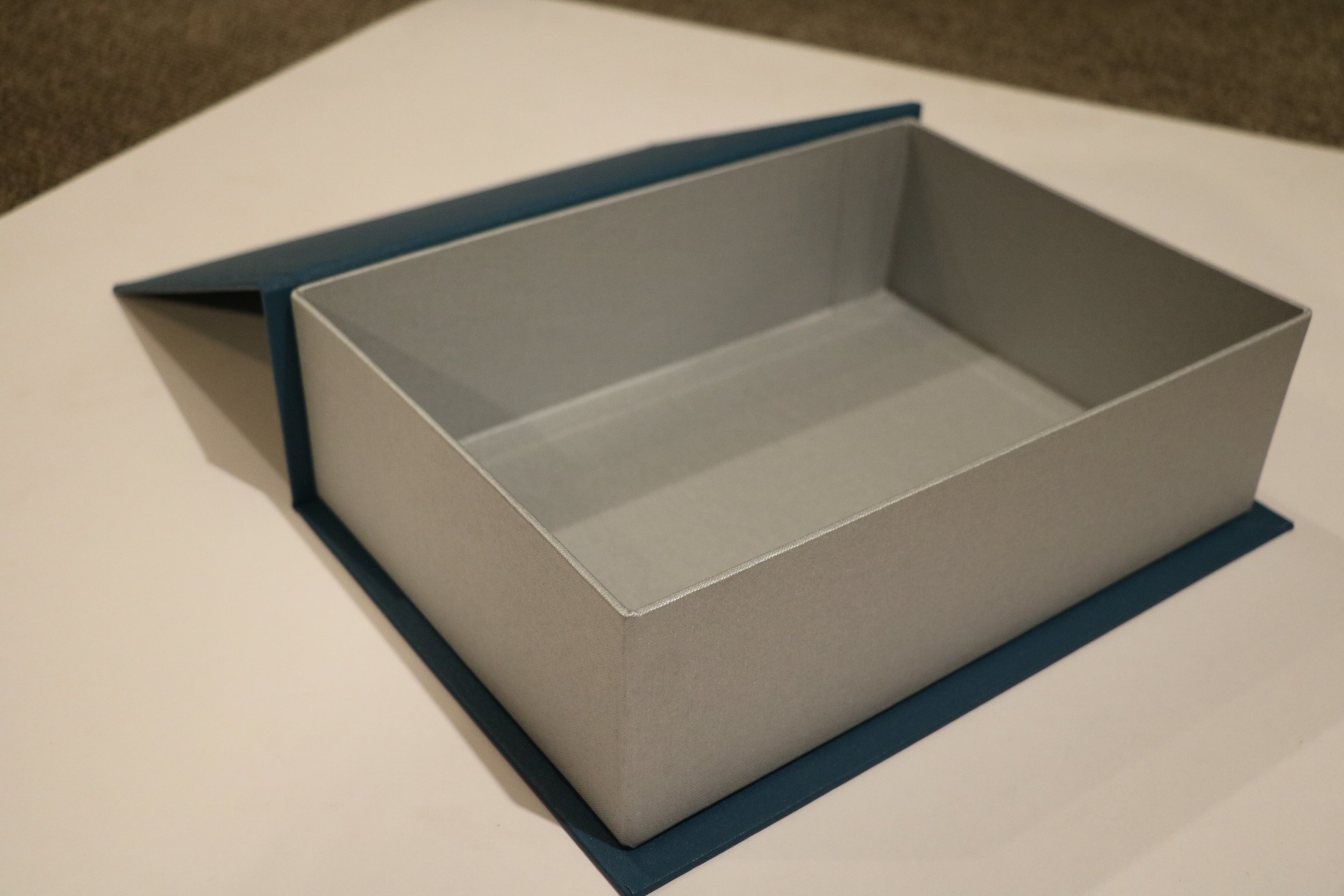 Custom made box on table laying open
